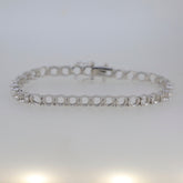 Sterling Silver Semi Mount Tennis Bracelet Setting featuring round 7x7mm gemstone placeholder, stainless steel tongue.